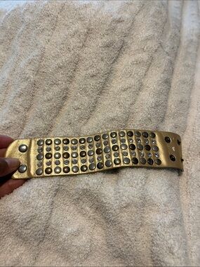 Gold-Tone Studded Wide Bracelet with Rhinestone Accent
